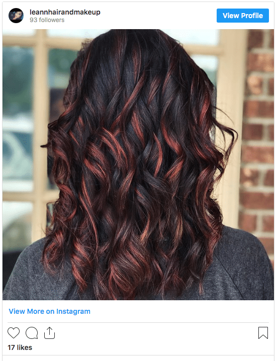 black color hair with red highlights instagram post