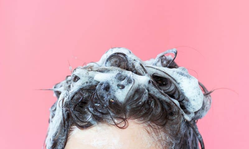 bubble hair dye massaged into hair