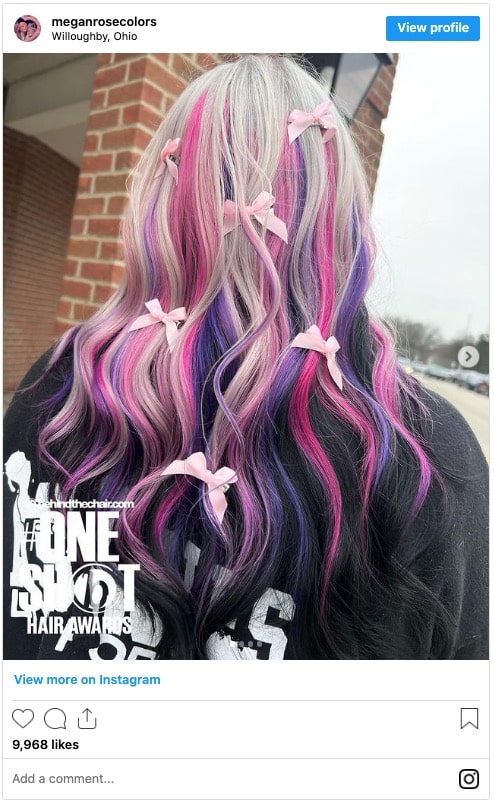 pink and purple highlights on blonde hair instagram post