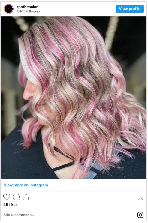 Pink streaks in blonde hair